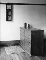 SA0587 - Photo shows a wall clock by Isaac N. Youngs of New Lebanon and a counter used in the weave room in the sisters